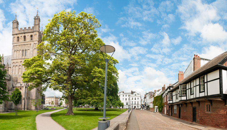 Exeter street showing the cathedral and Tudor style houses